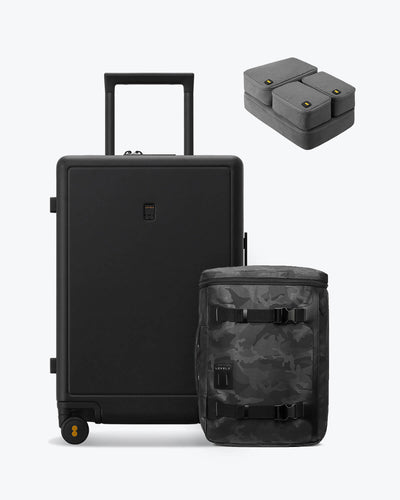 backpack and checked black luggage set