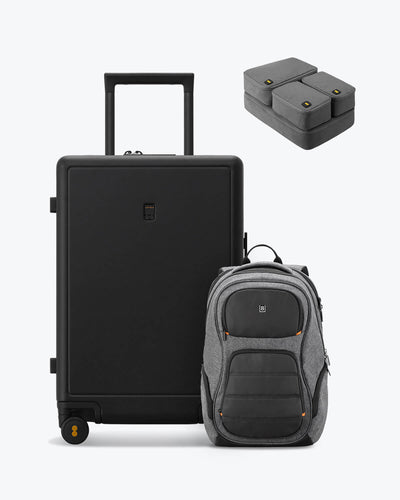 backpack and checked black luggage set